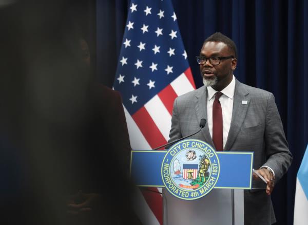 Chicago Mayor Brandon Johnson speaking at podium