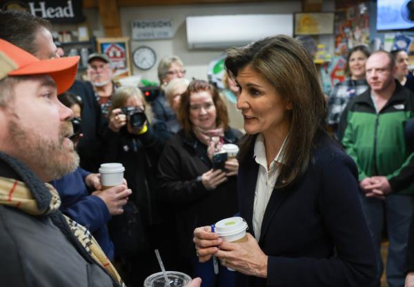 NEWFIELDS, NEW HAMPSHIRE - JANUARY 19: Republican presidential candidate former U.N. Ambassador Nikki Haley greets people at the Newfields Country Store on January 19, 2024 in Newfields, New Hampshire. Haley co<em></em>ntinues to campaign across the state.  (Photo by Joe Raedle/Getty Images)
