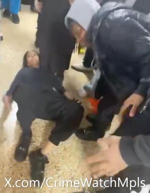 A photo of kids brawling at a Minneapolis high school.